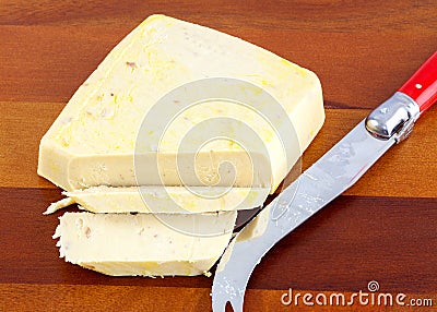 Vegan cheese with caramelised onion. Stock Photo