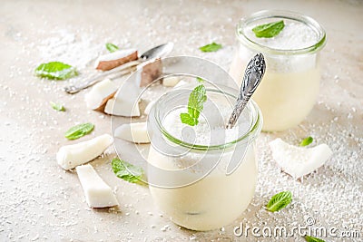 Vegan coconut panna cotta dessert in glass jar Stock Photo