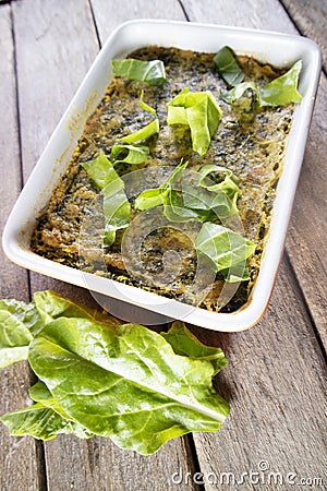 Vegan cuisine, Savory pie with chickpea flour and chard Stock Photo