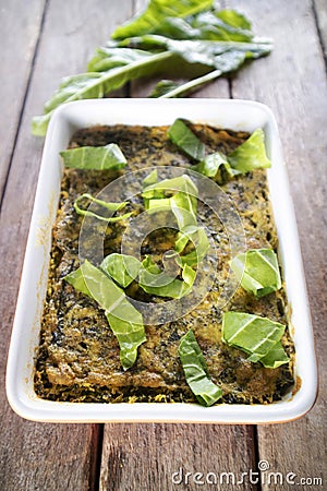 Vegan cuisine, Savory pie with chickpea flour and chard Stock Photo