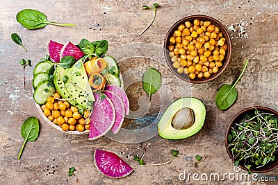 Vegan, detox Buddha bowl recipe with avocado, carrots, spinach, chickpeas and radishes. Top view, flat lay, copy space. Stock Photo