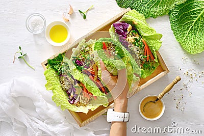 Vegan detox spring rolls with quinoa, sprouts and Thai peanut sa Stock Photo