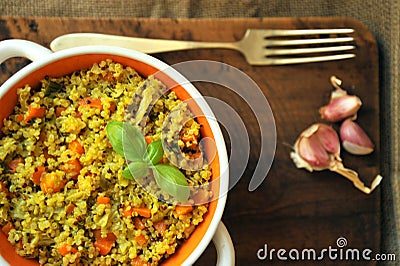 Vegan dish : quinoa dish with vegetables and garlic Stock Photo