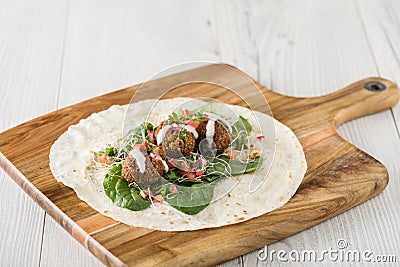 Vegan Falafel Wrap With Salsa Stock Photo