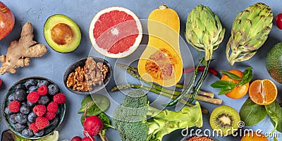 Vegan food panorama. Healthy diet concept. Fruits, vegetables, nuts, shot from above Stock Photo