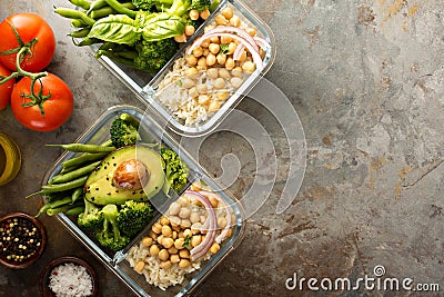 Vegan meal prep containers with cooked rice and chickpeas Stock Photo