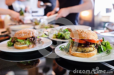 Vegan quinoa burger in a restaurant Stock Photo