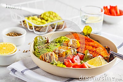 Vegan Rainbow bowl: vegetable meatballs, avocado, sweet potato a Stock Photo