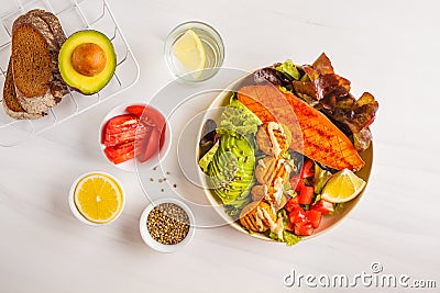 Vegan Rainbow bowl: vegetable meatballs, avocado, sweet potato a Stock Photo