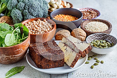 Vegan sources of protein. Tofu, chickpeas, lentils, nuts, spinach and broccoli - vegetable proteins Stock Photo