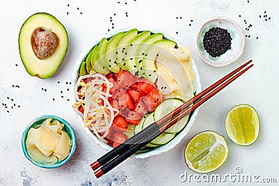 Hawaiian watermelon poke bowl with avocado, cucumber, mung bean sprouts and pickled ginger. Top view, overhead Stock Photo