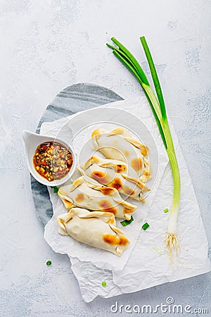 Vegetable empanadas with chimichurri sauce. Latin American cuisine Stock Photo