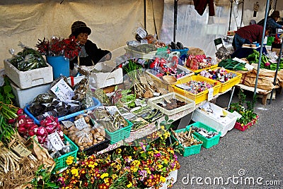 Vegetable market stall at morning market in the old town of Hida Takayama, Japan Editorial Stock Photo