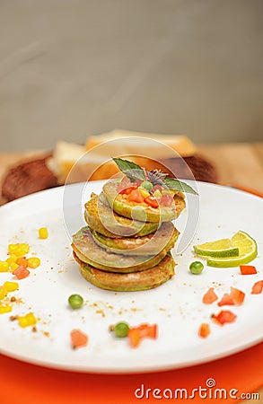 Vegetable pancakes on a plate Stock Photo