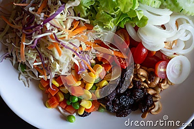 Vegetable salad in a bowl on the table Cuisine home top view Stock Photo