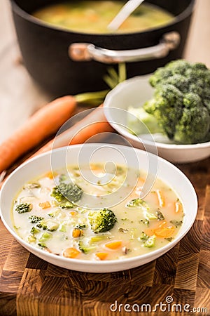 Vegetable soup from broccoli carrot onion and other ingredients. Healthy vegetarian food and meals Stock Photo