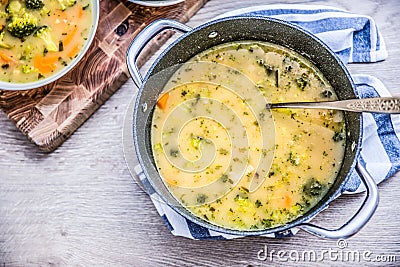 Vegetable soup from broccoli carrot onion and other ingredients. Healthy vegetarian food and meals Stock Photo