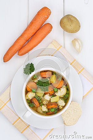 Vegetable soup meal with fresh vegetables in bowl from above Stock Photo