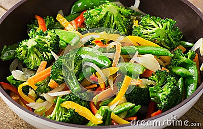 Vegetable stir fry in a pan. Stock Photo