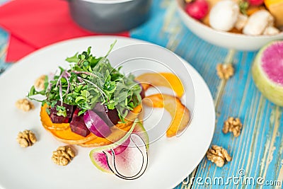 Vegetable vegetarian salad in a white plate Stock Photo