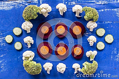 Vegetables on blue wood surface Stock Photo