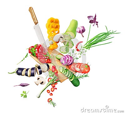 Vegetables fall on the board and cut with a knife Stock Photo