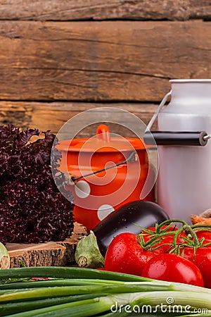 Vegetables mix and milk cans. Stock Photo