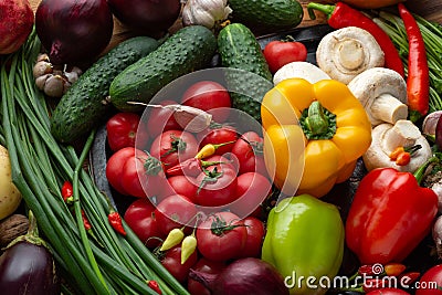 Vegetables and nuts on a brown wooden background Stock Photo