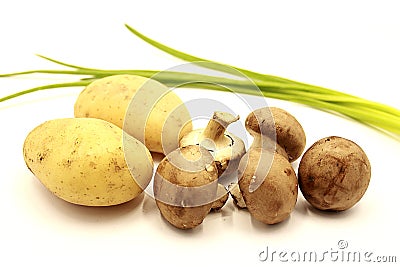 Vegetables: potatoes, mushrooms, green onions isolated Stock Photo