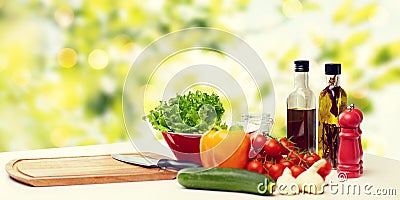 Vegetables, spices and kitchenware on table Stock Photo