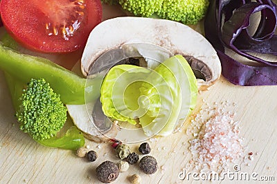 áƒžVegetables on the table, tomatoes, broccoli , pepper and salt Stock Photo