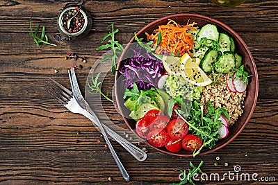 Buddha bowl lunch with grilled chicken and quinoa, tomato, guacamole Stock Photo