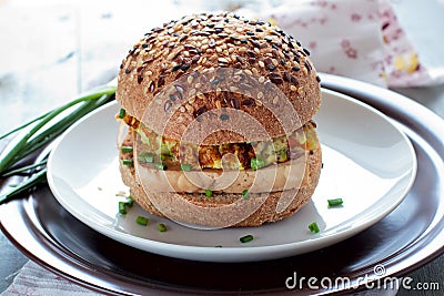 Vegetarian burgers with wholegrain buns, tofu and vegetables Stock Photo