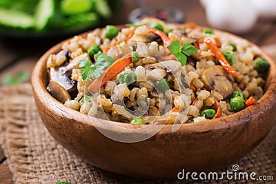 Vegetarian crumbly pearl barley porridge Stock Photo