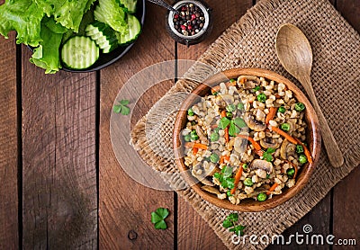 Vegetarian crumbly pearl barley porridge Stock Photo