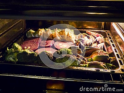 Vegetarian cuisine. Cooked vegetables in the oven. Stock Photo
