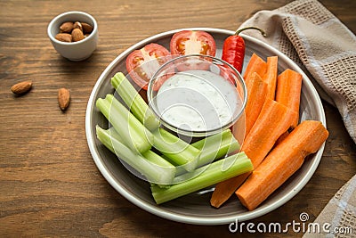 Vegetarian healthy snacks, vegetable snack: carrots, celery, tom Stock Photo