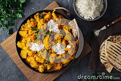 Vegetarian indian food Cauliflower curry basmati rice naan bread Healthy food Stock Photo