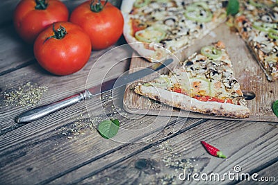 Vegetarian italian pizza on wodden table. Stock Photo