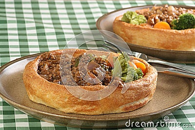 Vegetarian mince in giant yorkshire puddings Stock Photo