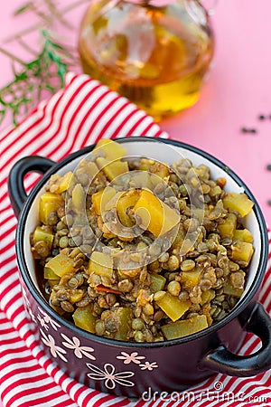 Vegetarian pumpkin lentil curry stew with rosemary Stock Photo
