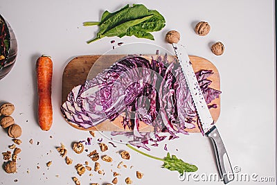 Vegetarian salad with purple cabbage.carrot.lay flat. Stock Photo