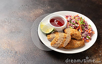 Vegetarian vegan southern fried nuggets served with sweet chilli sauce and cabbage salad Stock Photo