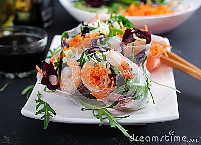 Vegetarian vietnamese spring rolls with spicy shrimps, prawns, carrot Stock Photo