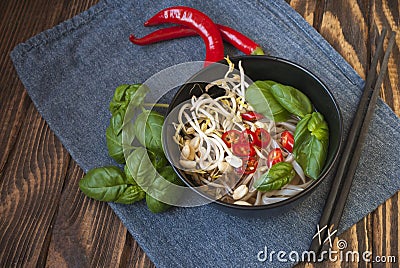 Vegetarian vietnamese style soup pho with garnishes. Stock Photo