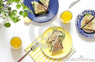 Vegetarian wheat bran sandwich above the yellow plate. Healthy homemade breakfast concept flat lay. Stock Photo