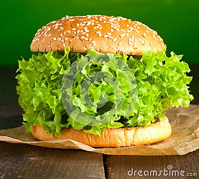 Veggie burger with salat and vegetables concept. Stock Photo