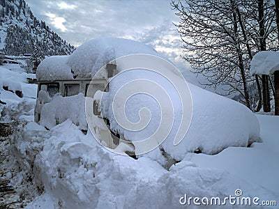 Vehicle buried under the huge snow Stock Photo