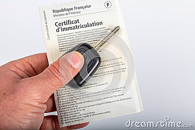 vehicle registration certificate and key Stock Photo