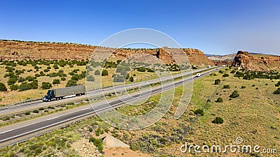 Vehicle and Truck Traffic Travel Along Interstate 40 in New Mexico Stock Photo